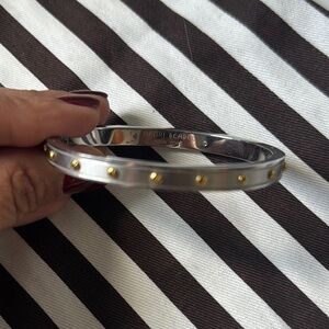 Henri Bendel Silver Bangle with Gold Studs